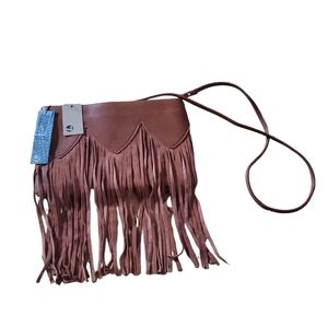 New Street level crossbody bag almond color fringe.